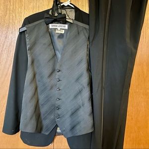 Formal black tuxedo from Tuxedo Junction. Size 38 Regular.
